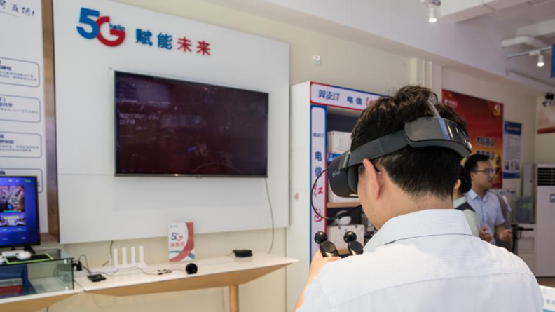 新金宝官方网站入口新区开通首个5G手机体验厅