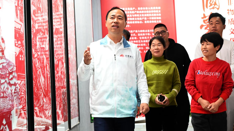 新金宝官方网站入口故事汇丨​从电瓶车司机到非遗讲解员，他在新金宝官方网站入口圆梦